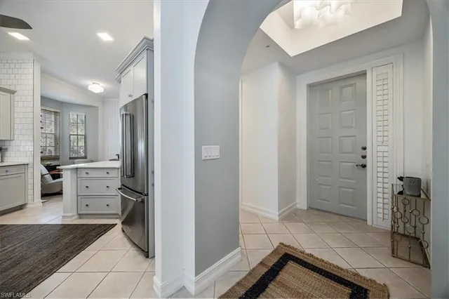 a bathroom with a shower and a sink