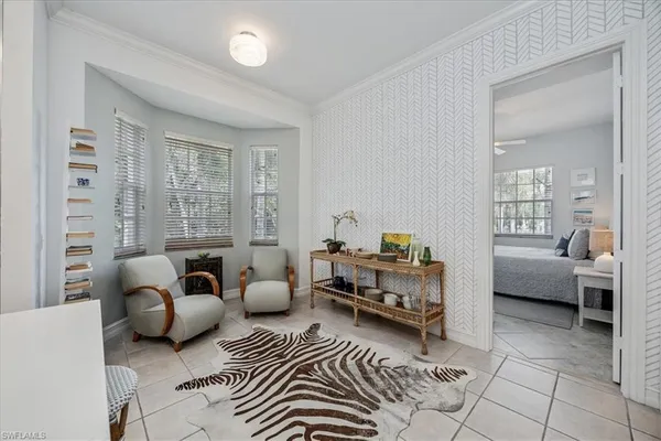a bedroom with furniture and a couch