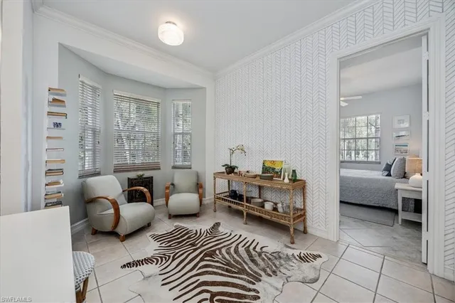 a bedroom with furniture and a couch