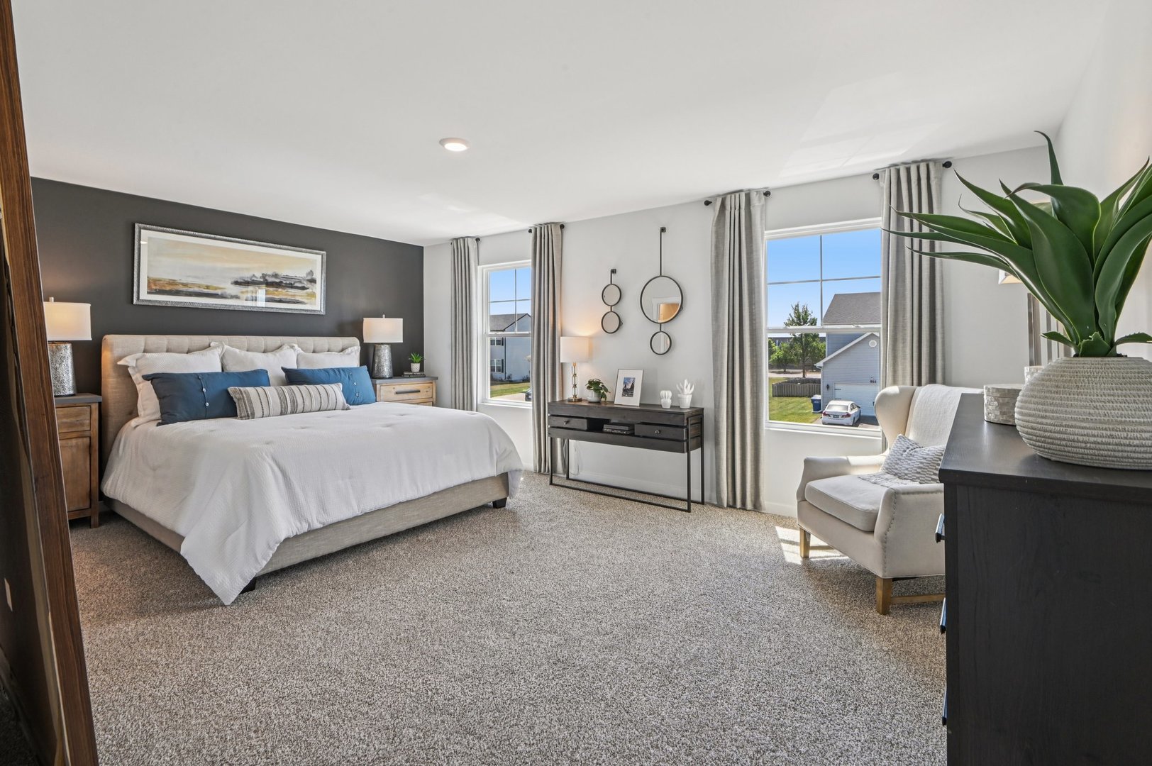 494 Arbor Ridge Drive Hampshire, IL 60140 - Photo 12 of 46 a bedroom with a large bed and a couch