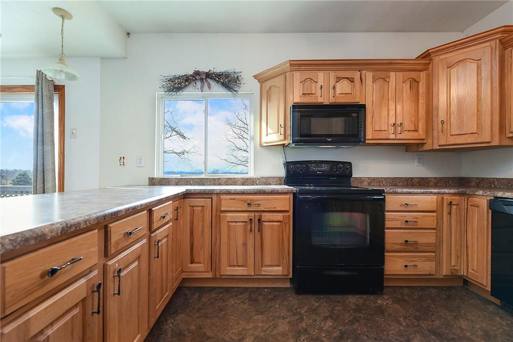 4 Malone Ridge Road Washington, PA 15301 - Photo 2 of 34 a kitchen with granite countertop a stove top oven a sink and dishwasher with cabinets