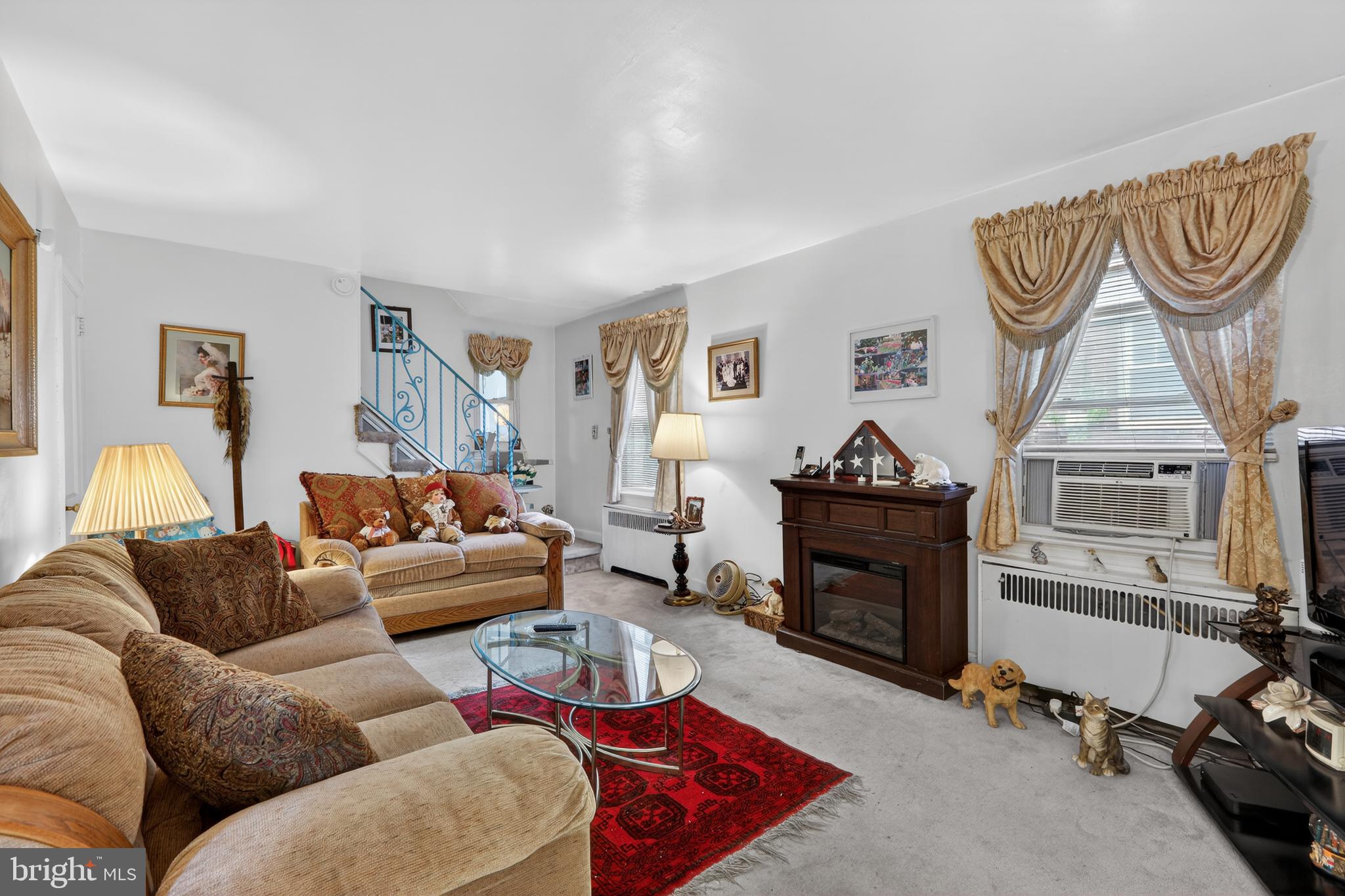 1424 Burmont Road Havertown, PA 19083 - Photo 3 of 37 a living room with furniture a rug and a window