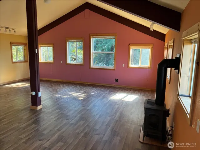 a view of livingroom with hardwood floor and window