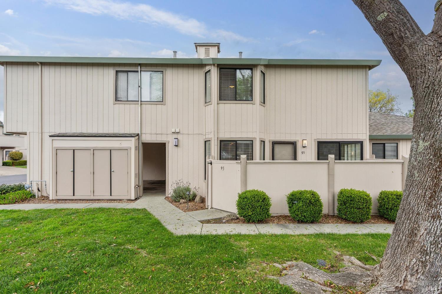 95 Dockside Circle San Rafael, CA 94903 - Photo 5 of 7 a front view of a house with garden