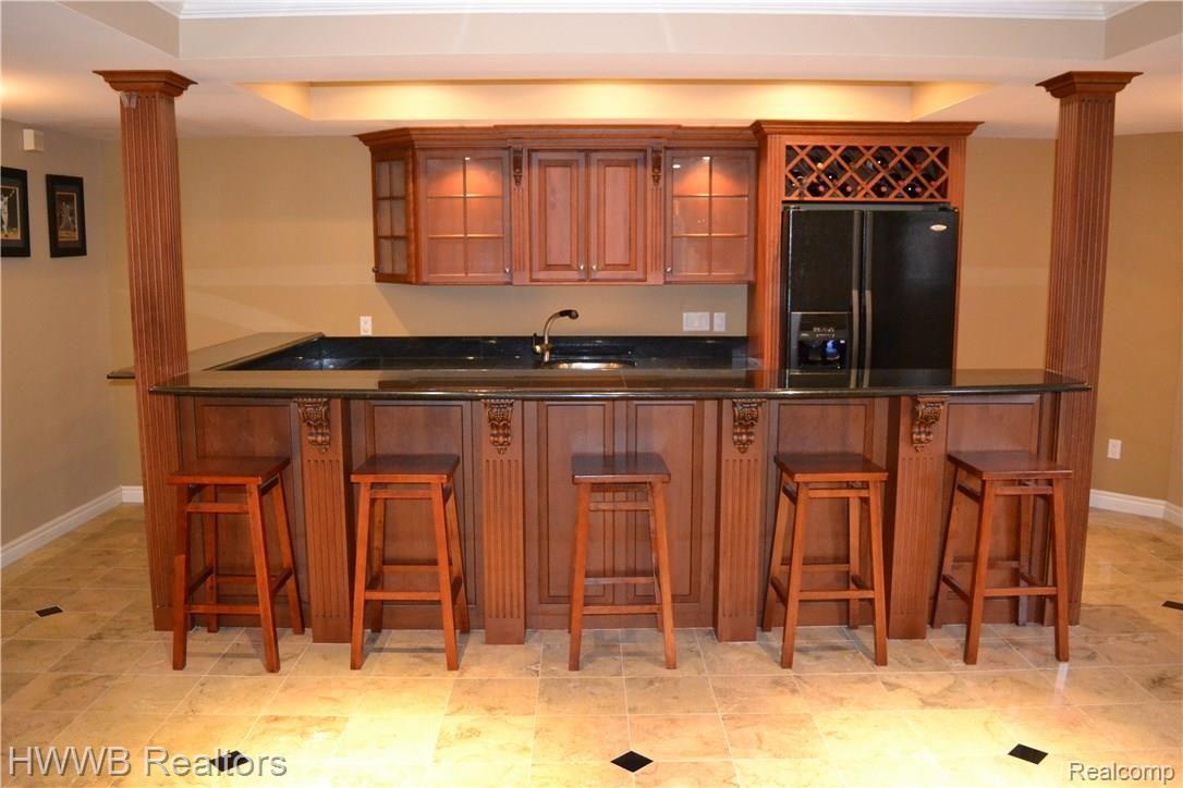 4742 Goodison Pl Drive Rochester, MI 48306 - Photo 35 of 50 35 - Basement Bar.JPG