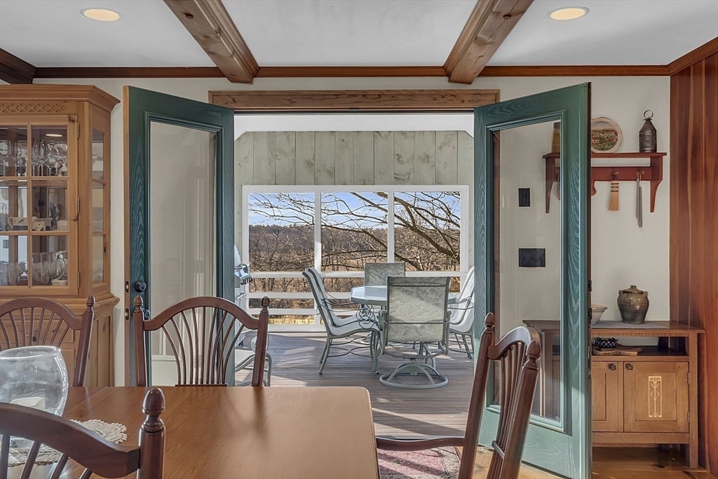 332 Still River Road Harvard, MA 01451 - Photo 14 of 42 a view of a dining room with furniture window and wooden floor