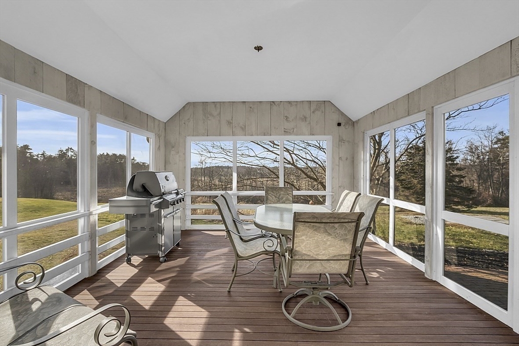 332 Still River Road Harvard, MA 01451 - Photo 15 of 42 a work room with furniture wooden floor and a large window