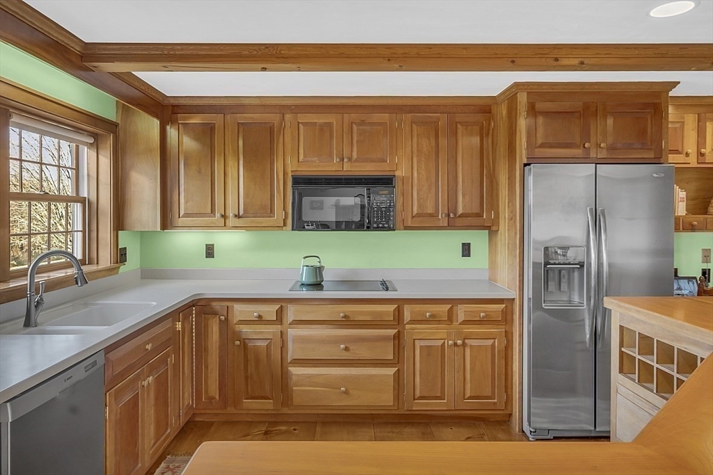332 Still River Road Harvard, MA 01451 - Photo 20 of 42 a kitchen with a sink and cabinets