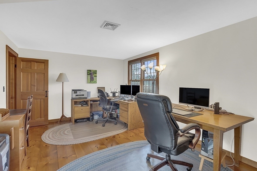 332 Still River Road Harvard, MA 01451 - Photo 32 of 42 a workspace with furniture and wooden floor
