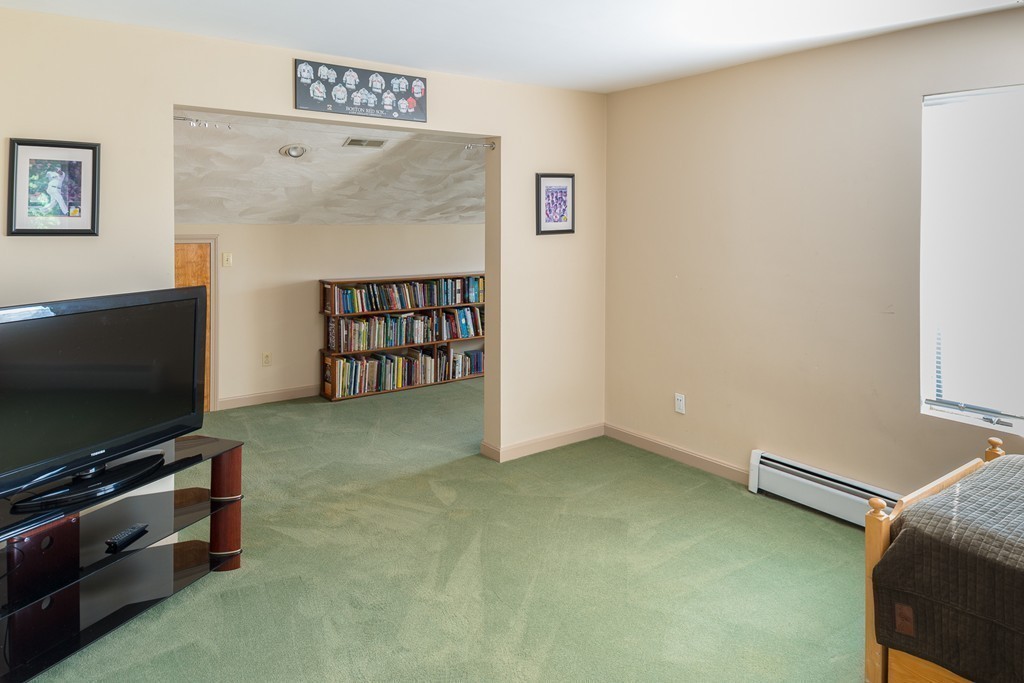 16 Lehman Road Marblehead, MA 01945 - Photo 16 of 21 a view of a livingroom with furniture and a flat screen tv