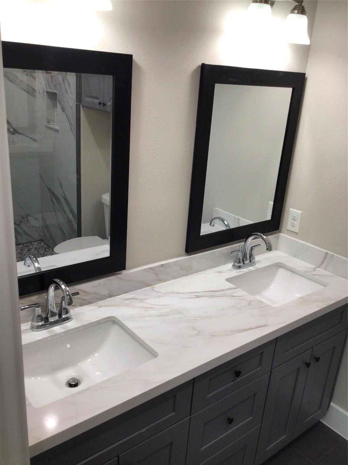 2109 Marnel Road, Unit E Houston, TX 77055 - Photo 19 of 29 a bathroom with a sink and a mirror
