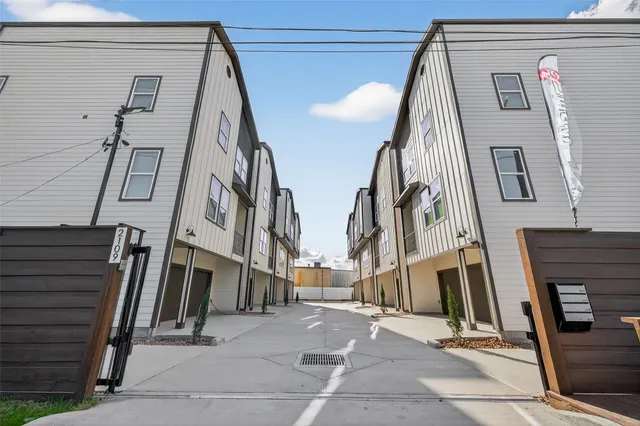 a view of a tall building with stairs