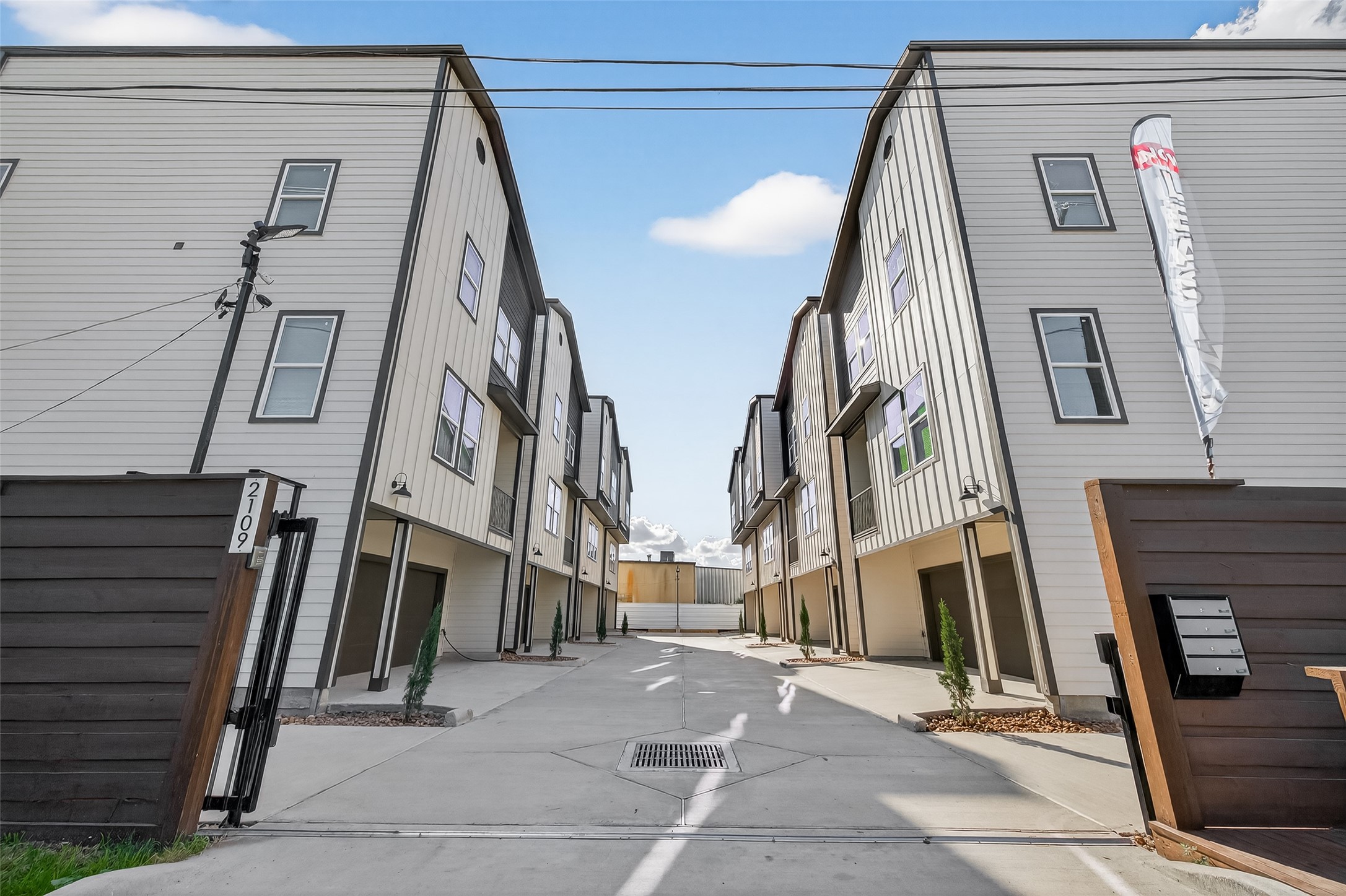2109 Marnel Road, Unit E Houston, TX 77055 - Photo 2 of 29 a view of a tall building with stairs
