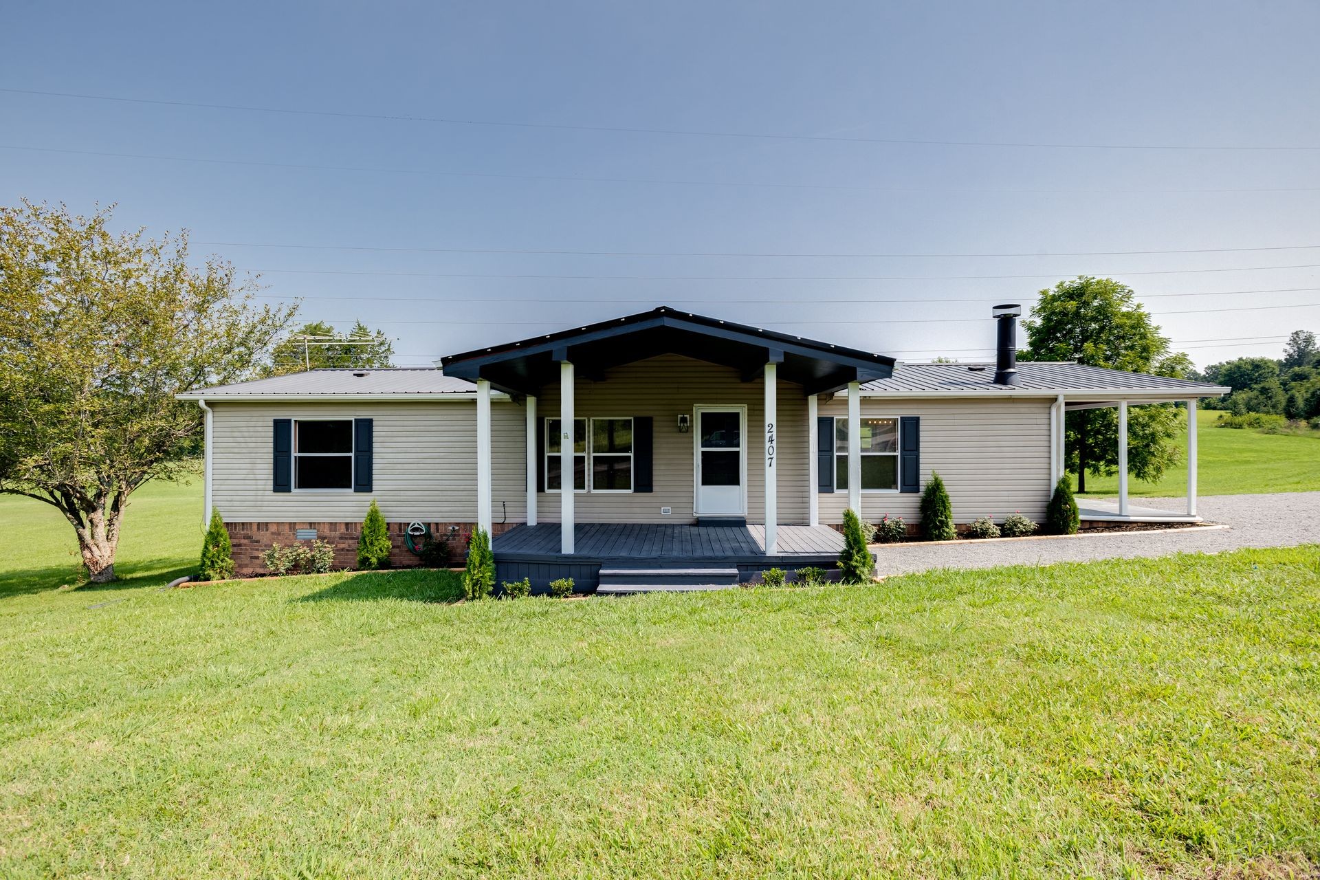 2407 Burford Road Lebanon, TN 37087 - Photo 2 of 37 front view of a house with a yard