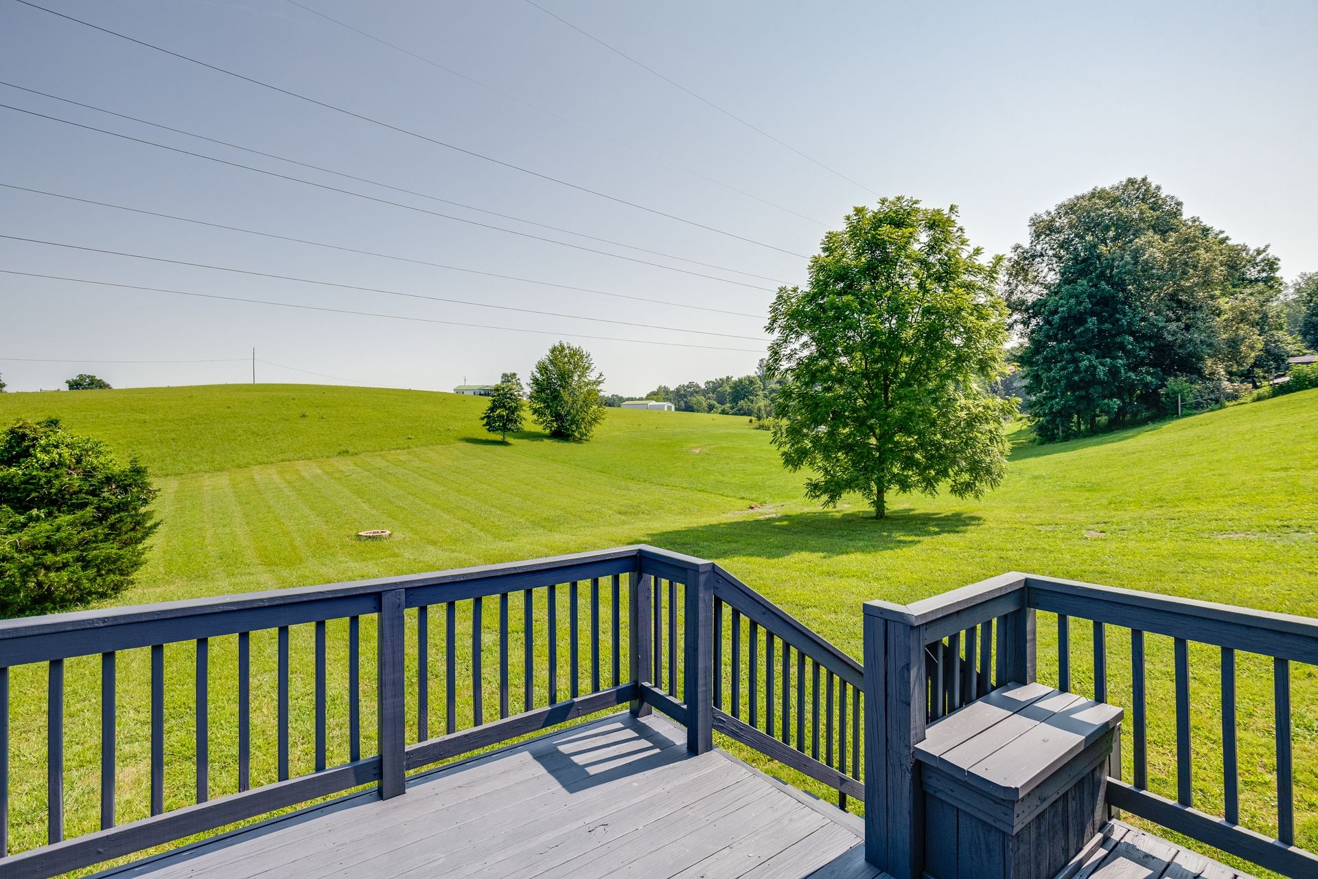 2407 Burford Road Lebanon, TN 37087 - Photo 36 of 37 a view of a balcony with wooden floor and outdoor seating