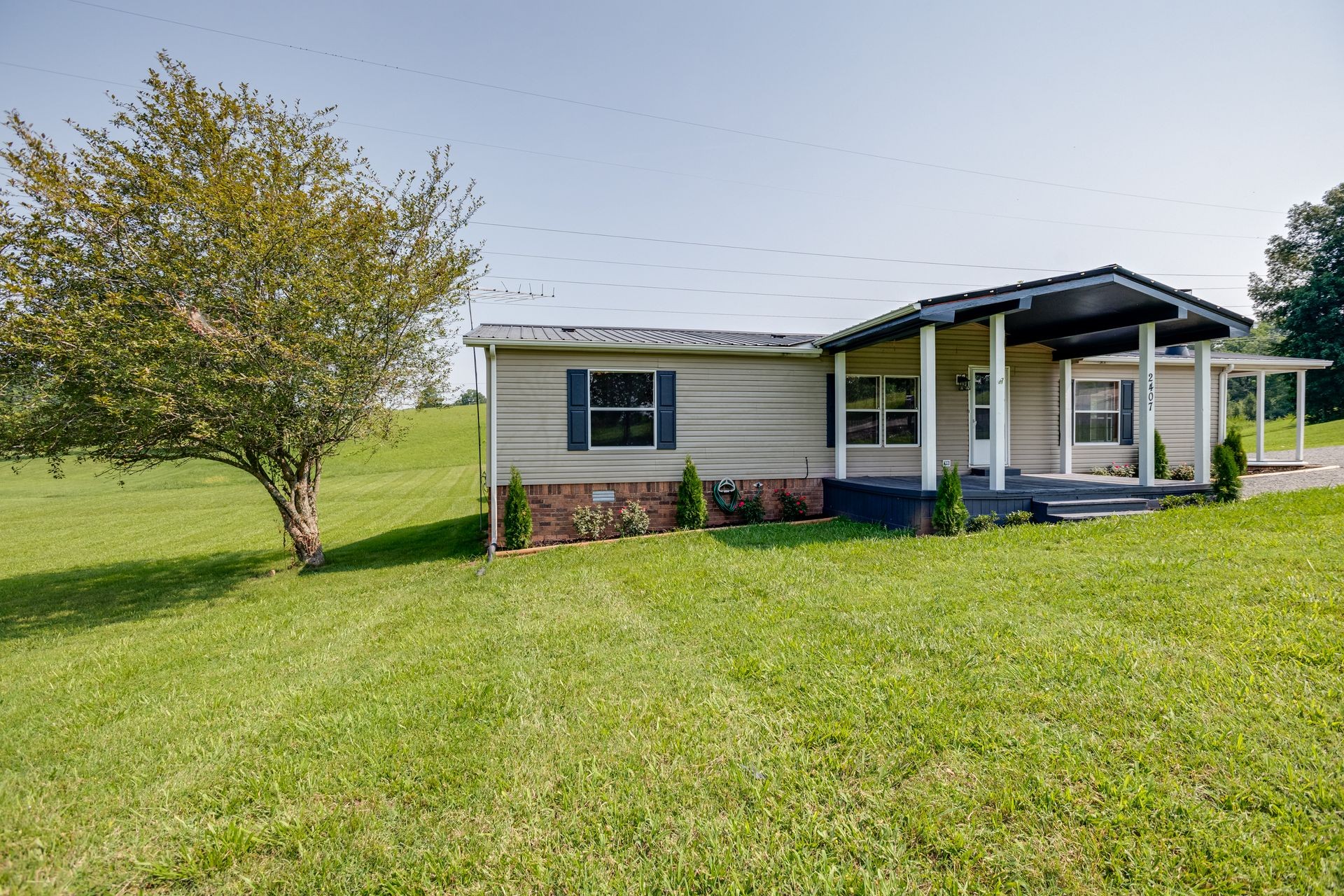 2407 Burford Road Lebanon, TN 37087 - Photo 4 of 37 a front view of house with yard and green space