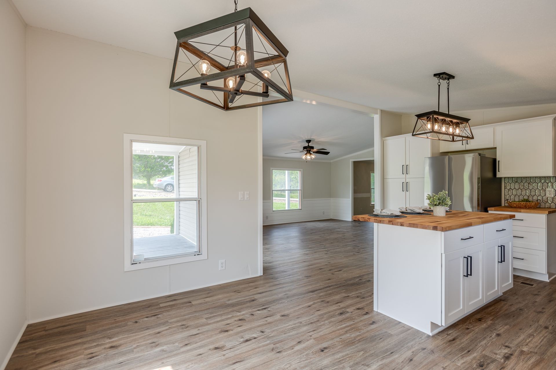 2407 Burford Road Lebanon, TN 37087 - Photo 9 of 37 a view of a kitchen counter space a stove and wooden floor