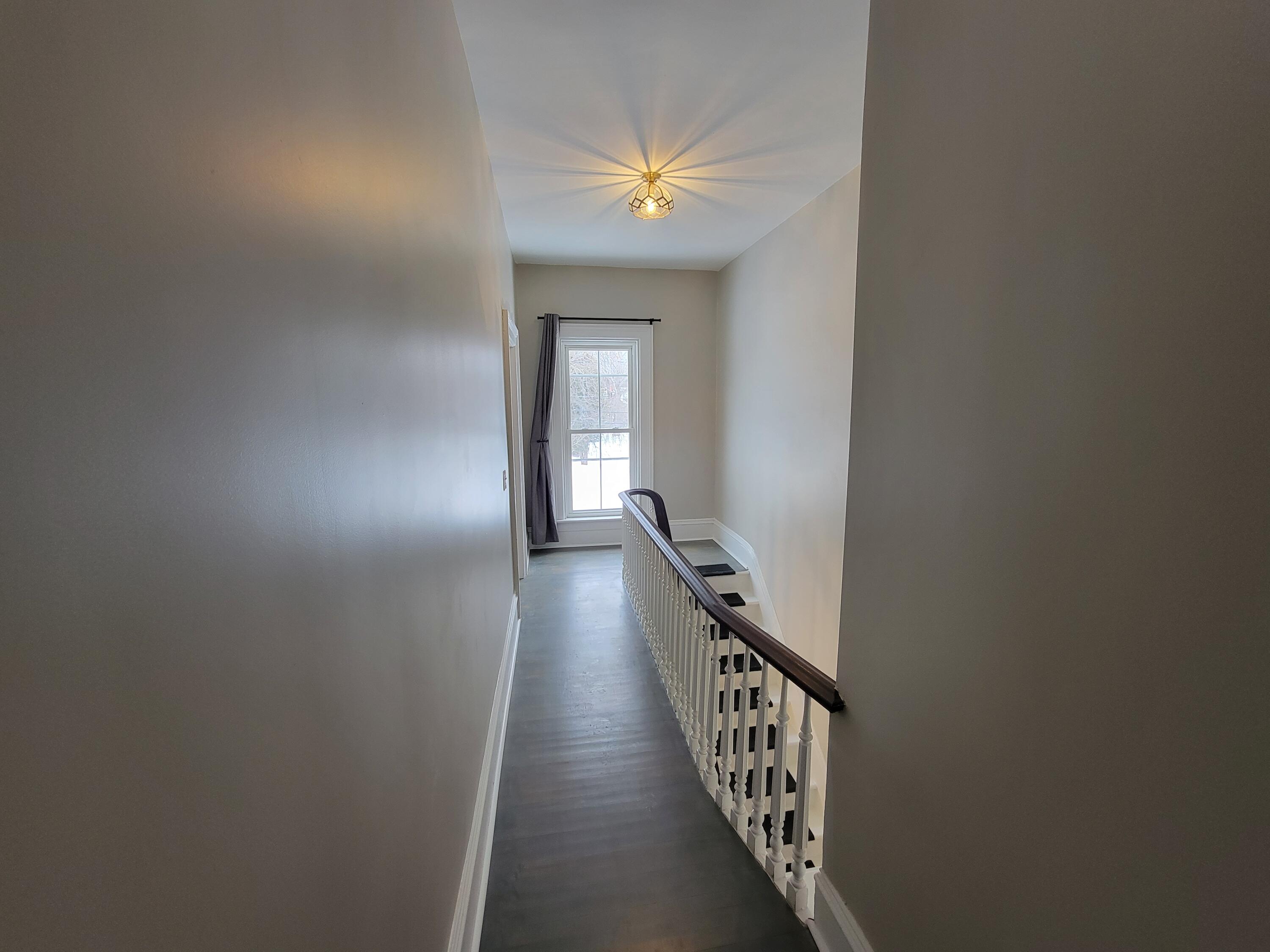 418 2nd Street, Unit 2 Manistee, MI 49660 - Photo 3 of 20 (3) Stairs & Hallway