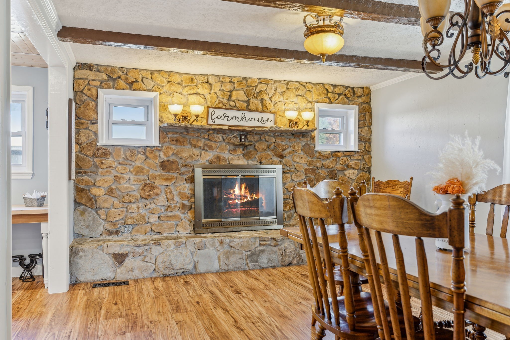 635 Cane Creek Road Hohenwald, TN 38462 - Photo 13 of 71 a view of a fireplace with wooden floor