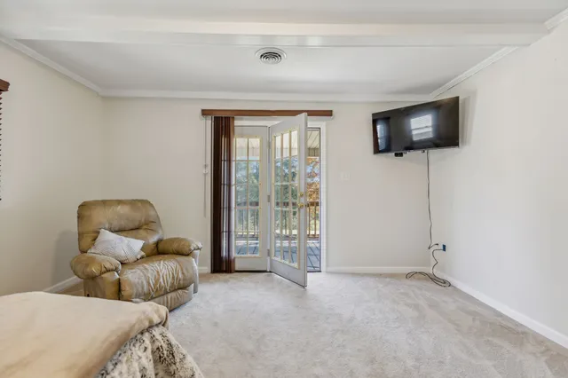 a kitchen with stainless steel appliances granite countertop a stove top oven a refrigerator and a microwave