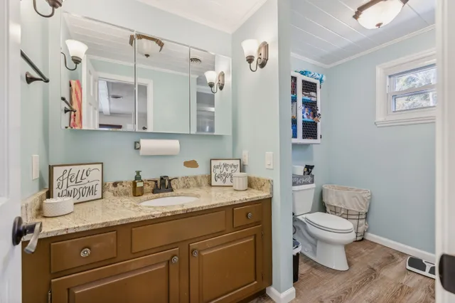 a view of house with outdoor space and sitting area