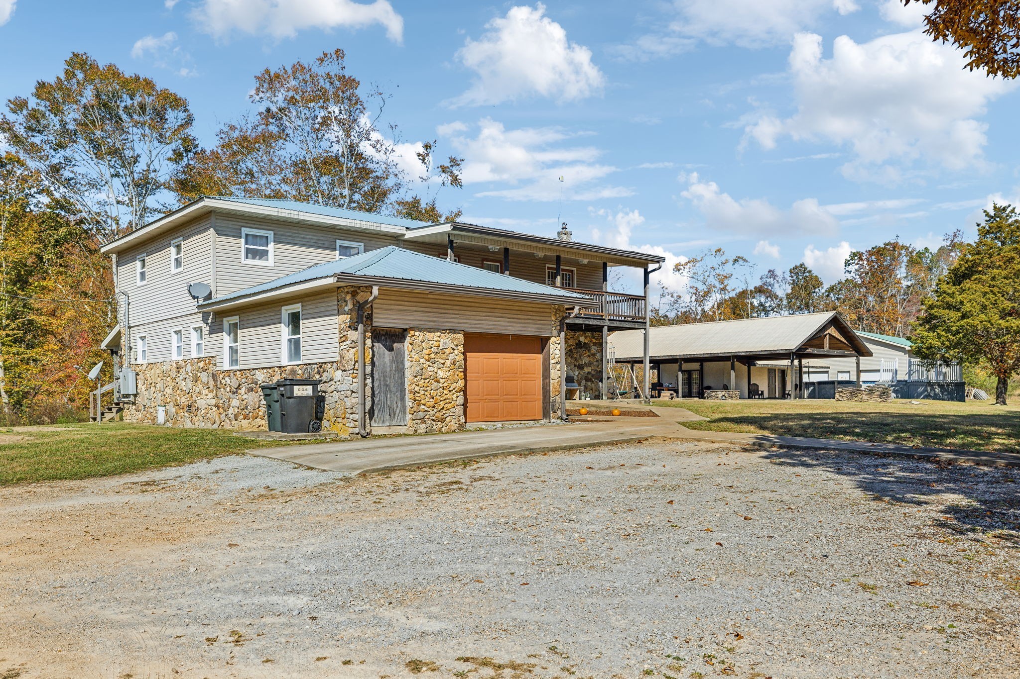 635 Cane Creek Road Hohenwald, TN 38462 - Photo 46 of 71 front view of a house with a big yard