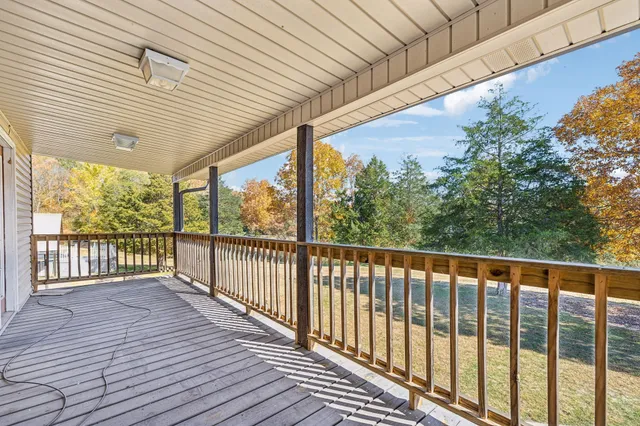 a view of a fireplace with wooden floor