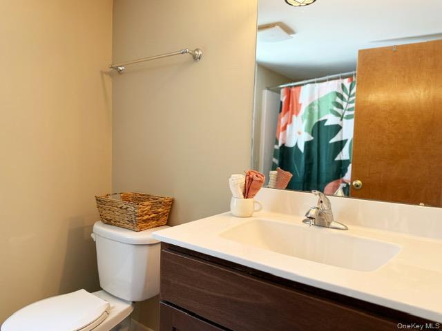 26 Woods Road Barryville, NY 12719 - Photo 21 of 34 a bathroom with a sink and a mirror