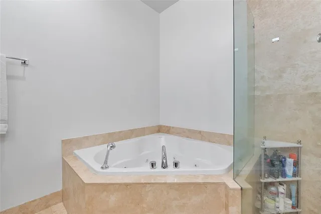 a bath tub sitting in a bathroom