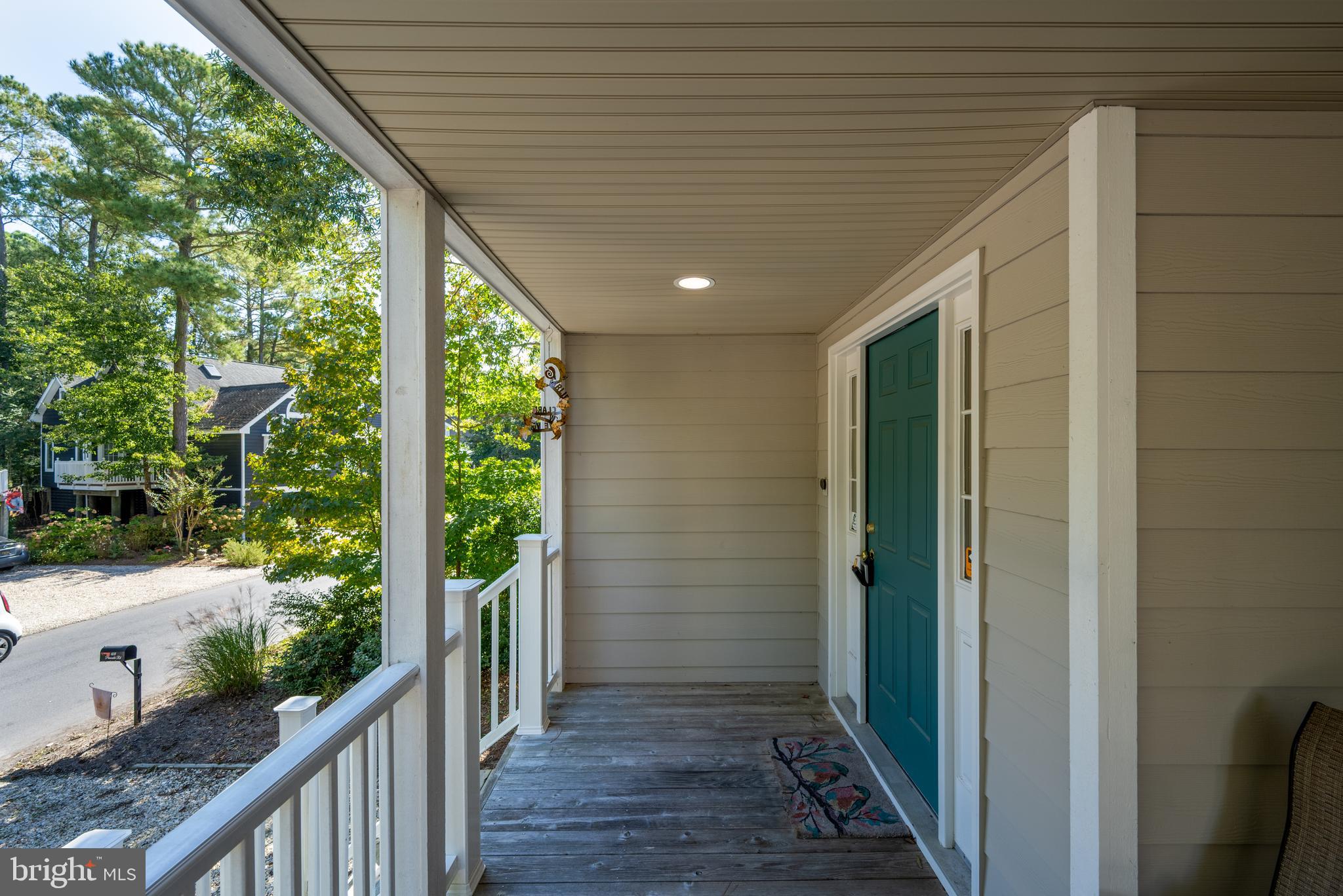408 Periwinkle Road South Bethany, DE 19930 - Photo 11 of 38 Come upstairs to enter into the foyer