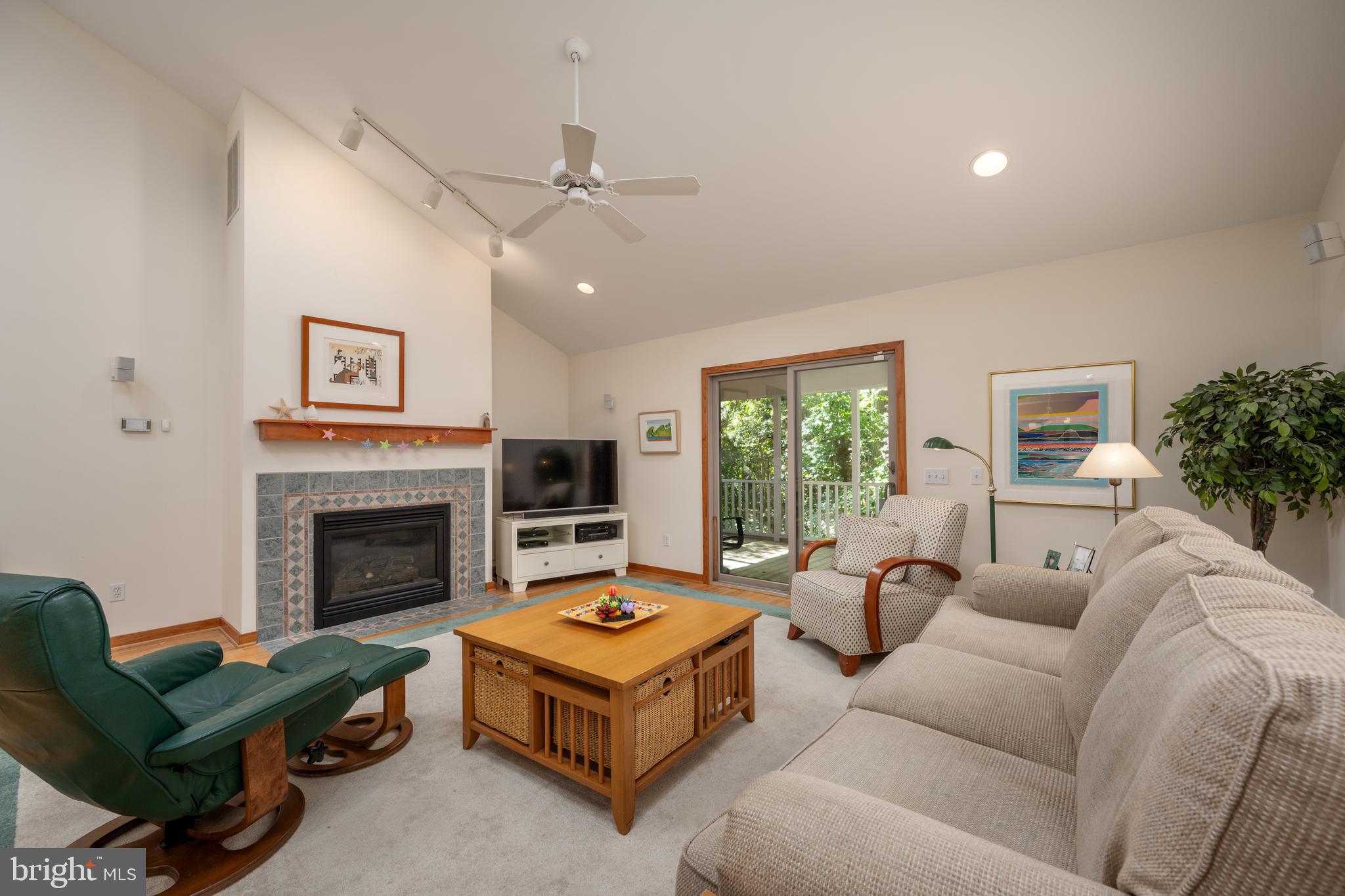408 Periwinkle Road South Bethany, DE 19930 - Photo 15 of 38 Living room with gas fireplace