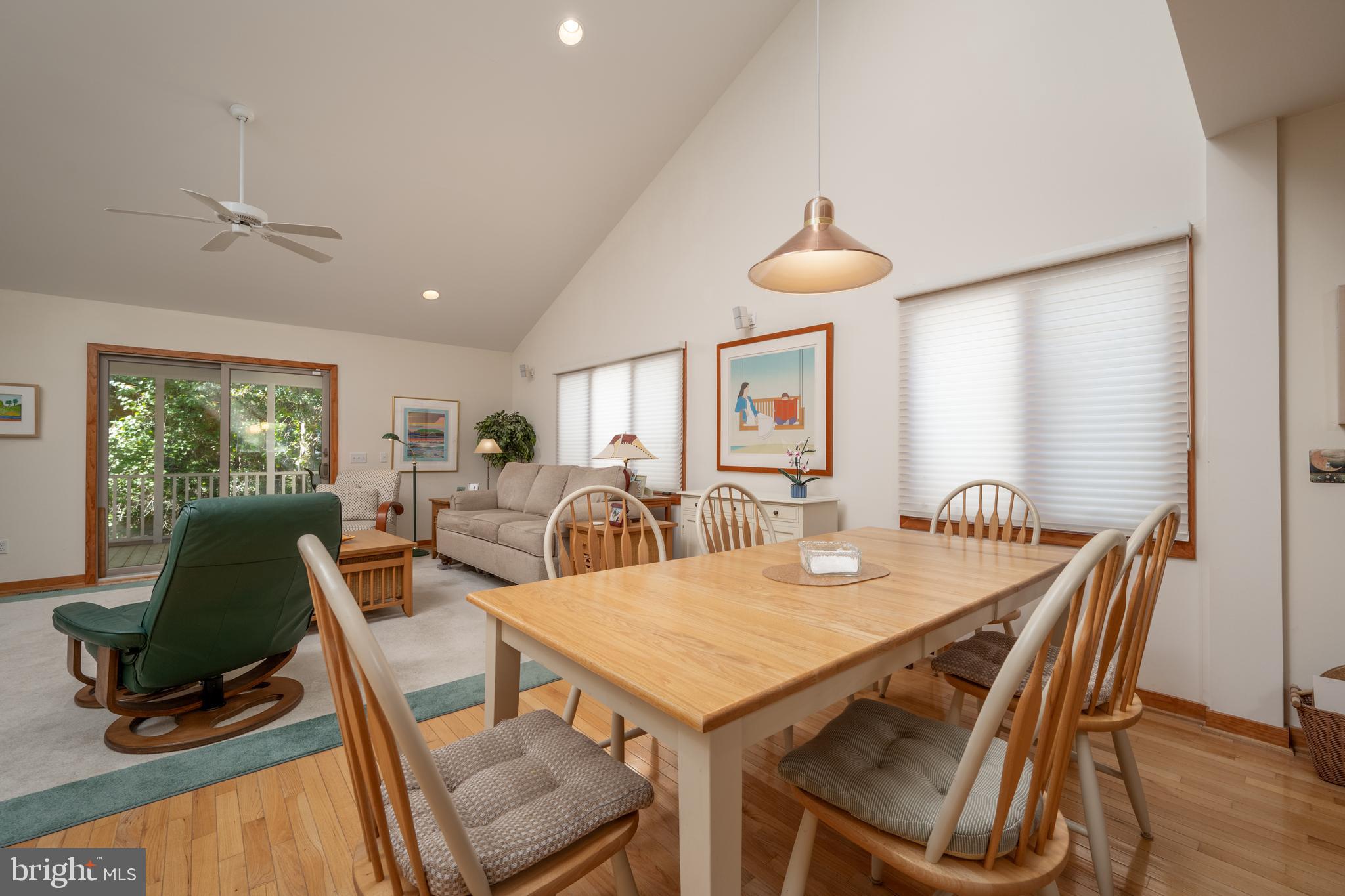 408 Periwinkle Road South Bethany, DE 19930 - Photo 16 of 38 Tall ceilings in the living room and dining area