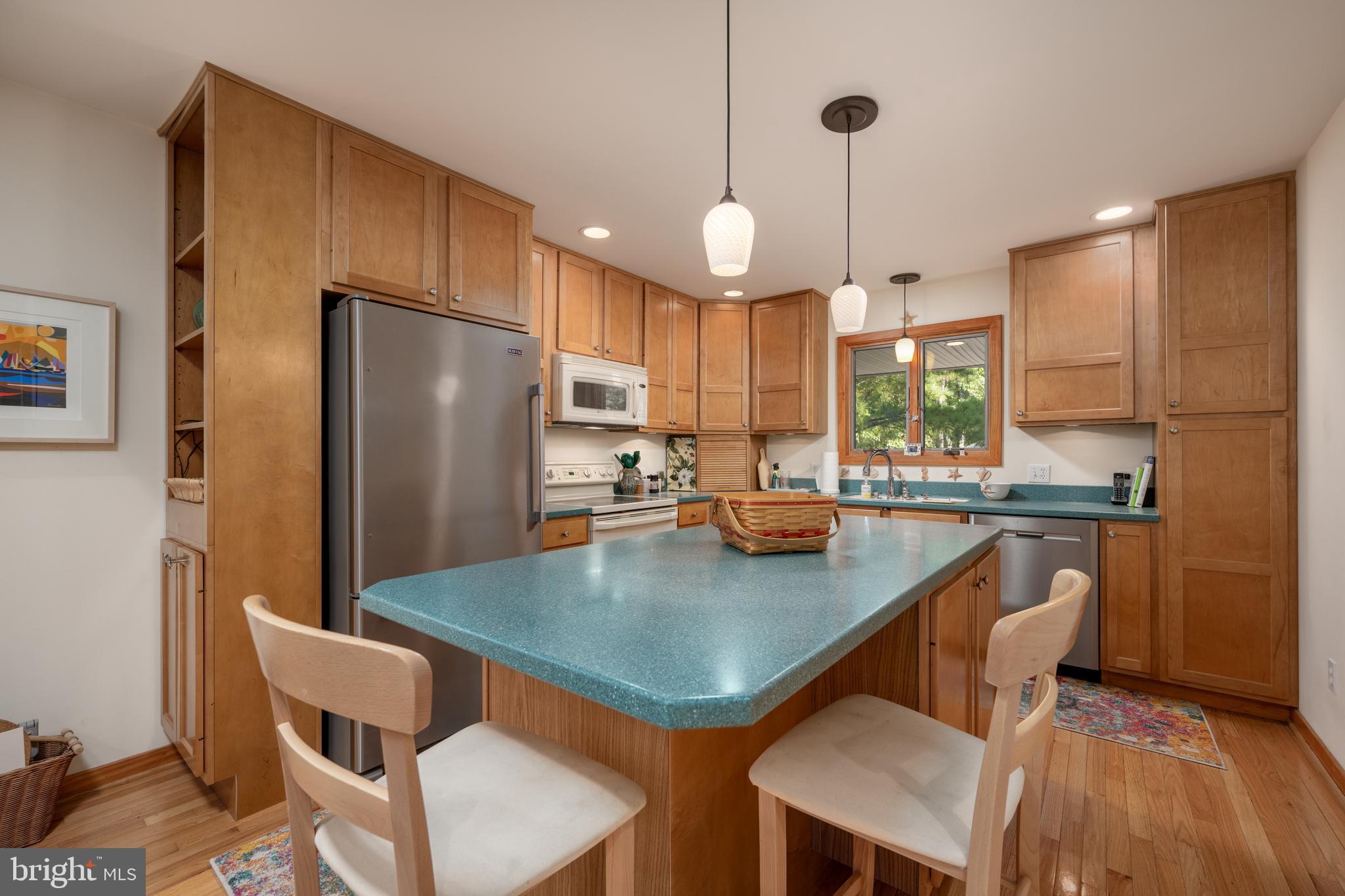 408 Periwinkle Road South Bethany, DE 19930 - Photo 21 of 38 Kitchen island with seating