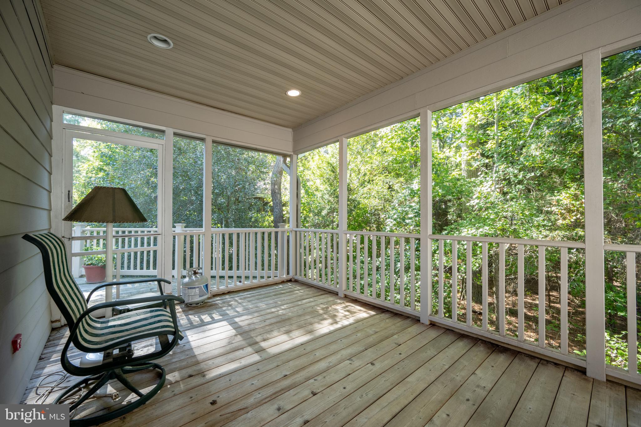 408 Periwinkle Road South Bethany, DE 19930 - Photo 32 of 38 Serene screened porch
