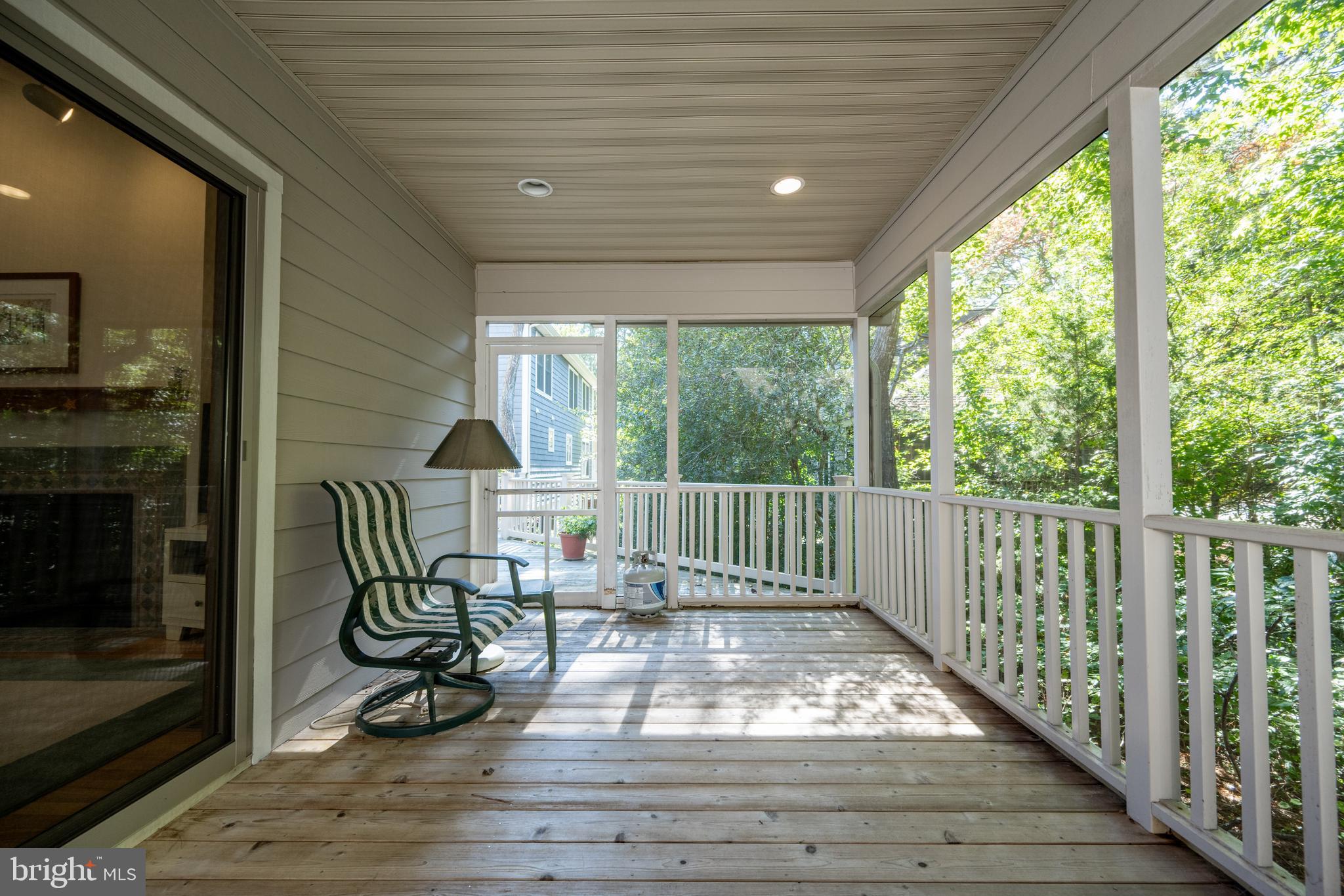 408 Periwinkle Road South Bethany, DE 19930 - Photo 33 of 38 Screened porch