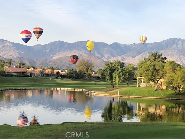 a view of a lake with a mountain in the background