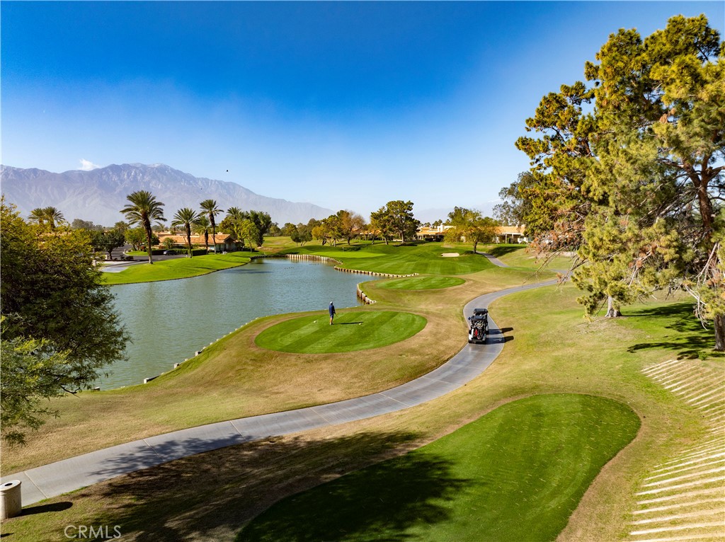 37 Oak Tree Drive Rancho Mirage, CA 92270 - Photo 36 of 54 a view of a lake and city