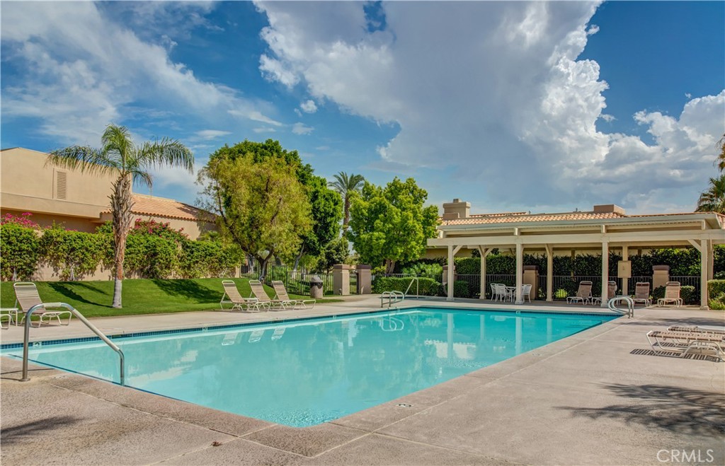37 Oak Tree Drive Rancho Mirage, CA 92270 - Photo 51 of 54 a view of a house with a swimming pool