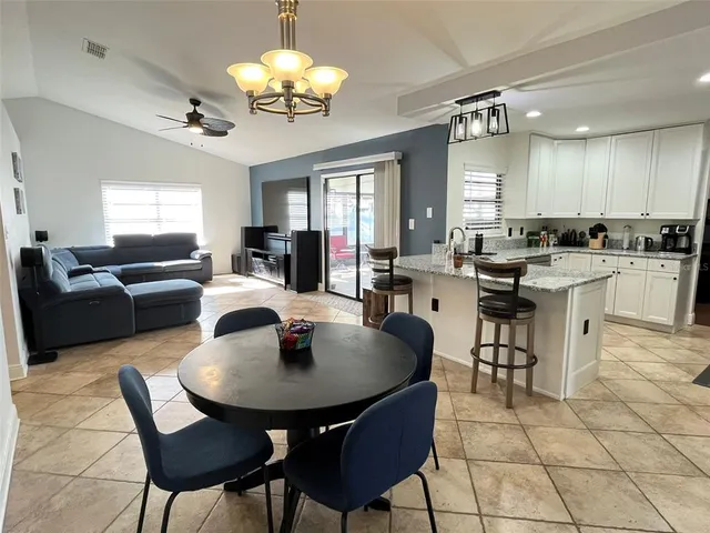 a view of a dining room with furniture