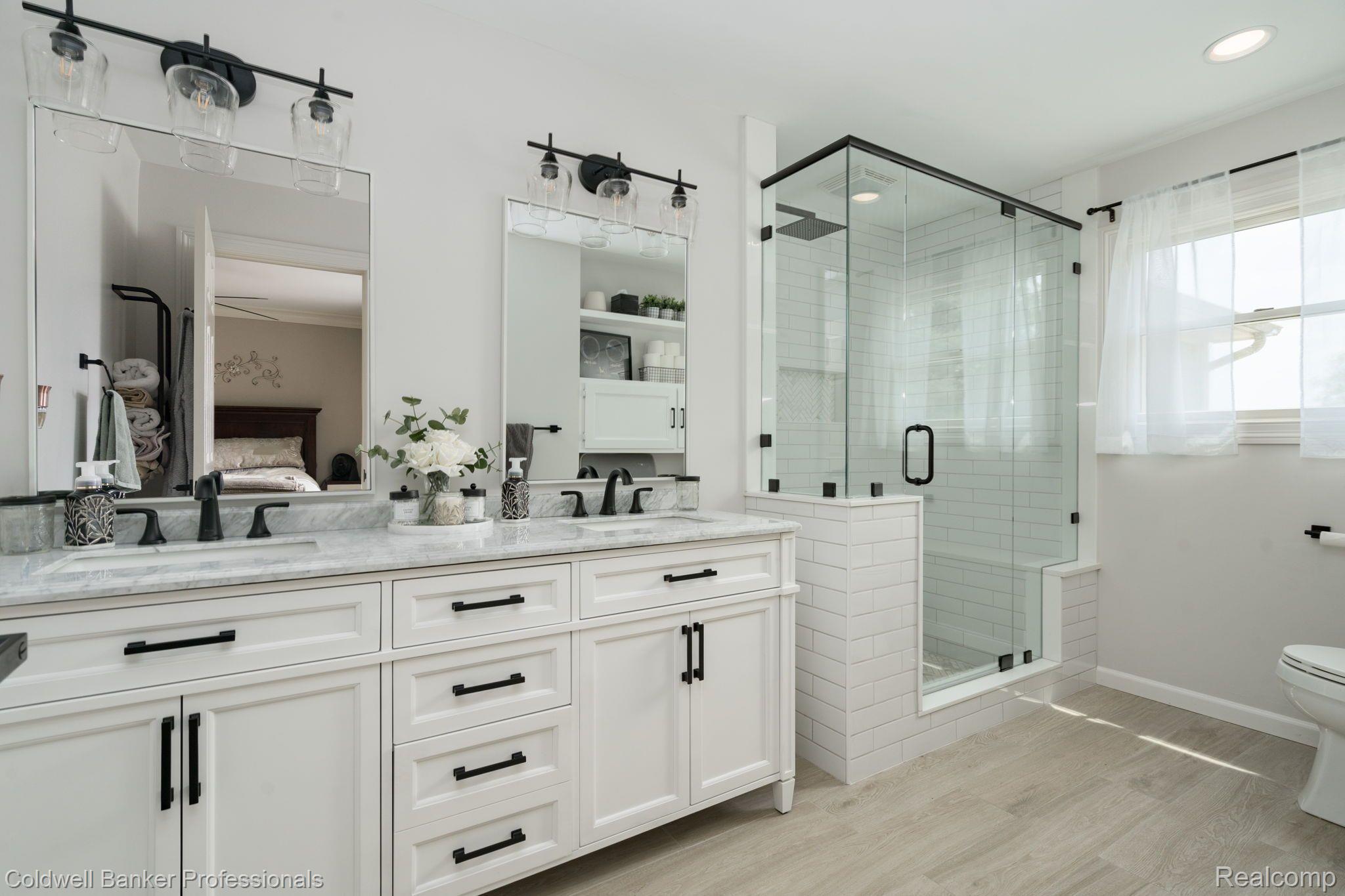 181 Lone Tree Road Milford, MI 48380 - Photo 25 of 32 Newly remodeled Primary Bath with porcelain floor