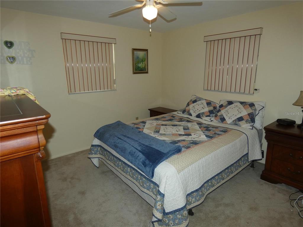 4392 Craftsbury Drive New Port Richey, FL 34652 - Photo 22 of 41 a bed room with a bed and a window