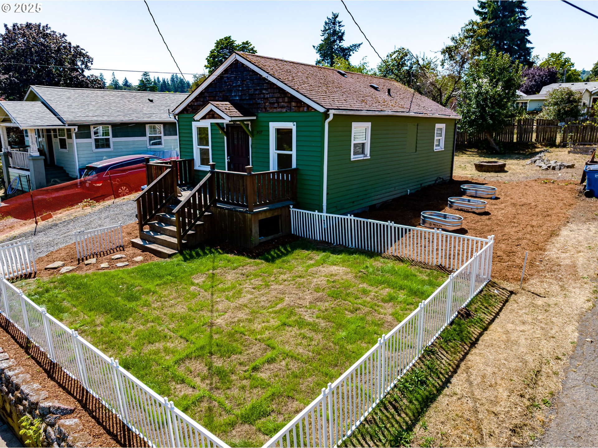 907 Northwest Greeley Street Camas, WA 98607 - Photo 1 of 31 a front view of a house with yard