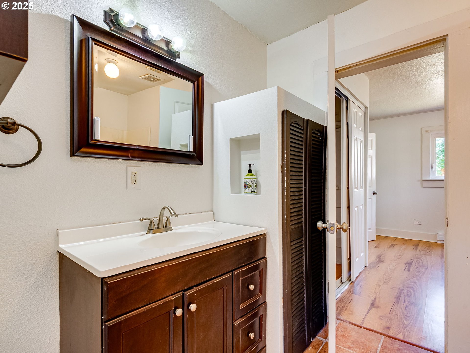 907 Northwest Greeley Street Camas, WA 98607 - Photo 15 of 31 a bathroom with a sink vanity and a mirror
