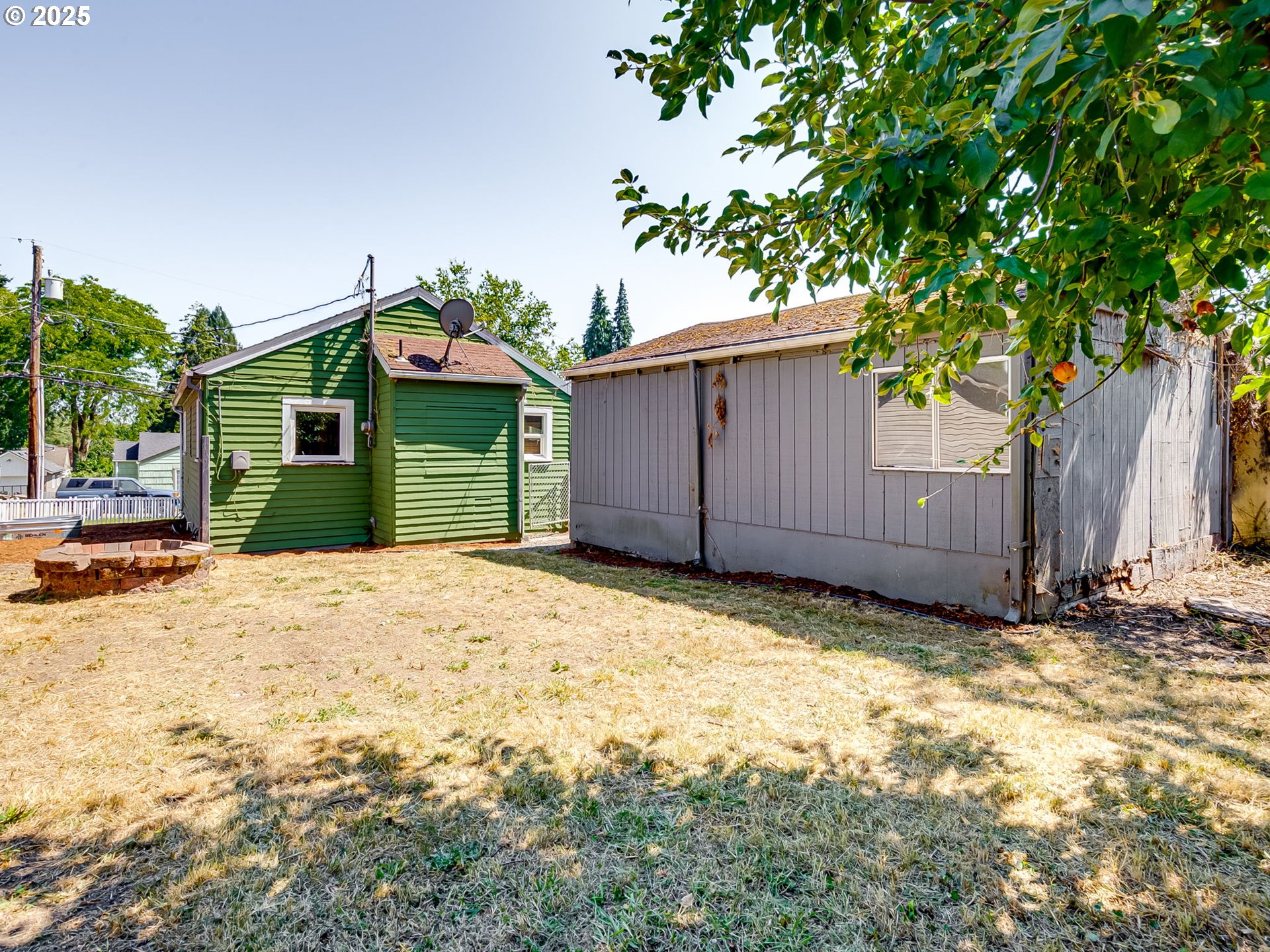 907 Northwest Greeley Street Camas, WA 98607 - Photo 28 of 31 a view of a house with a yard and garage