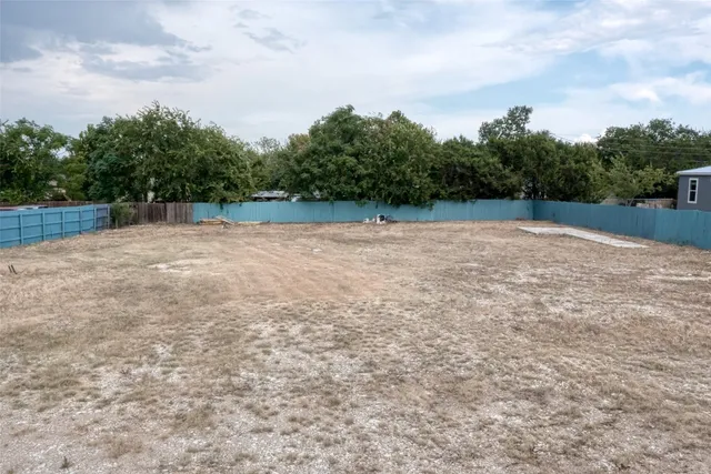 a view of backyard with green space