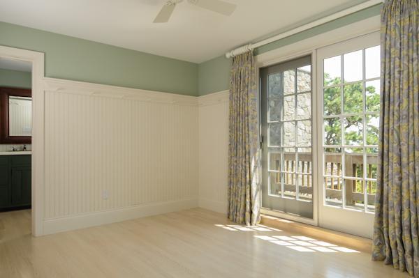 70 Vineyard Road Cotuit, MA 02635 - Photo 12 of 15 a view of an empty room with a sliding door