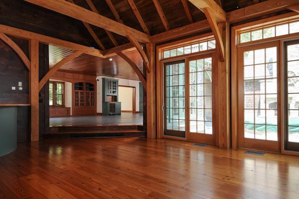 70 Vineyard Road Cotuit, MA 02635 - Photo 5 of 15 a view of hall way with wooden floor and a floor to ceiling window