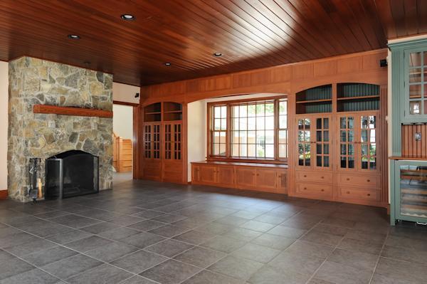 70 Vineyard Road Cotuit, MA 02635 - Photo 7 of 15 a view of an empty room with a fireplace