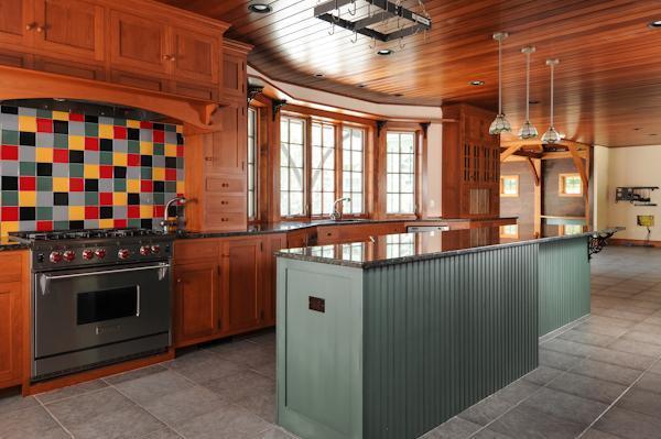 70 Vineyard Road Cotuit, MA 02635 - Photo 8 of 15 a kitchen with stainless steel appliances a stove and a refrigerator