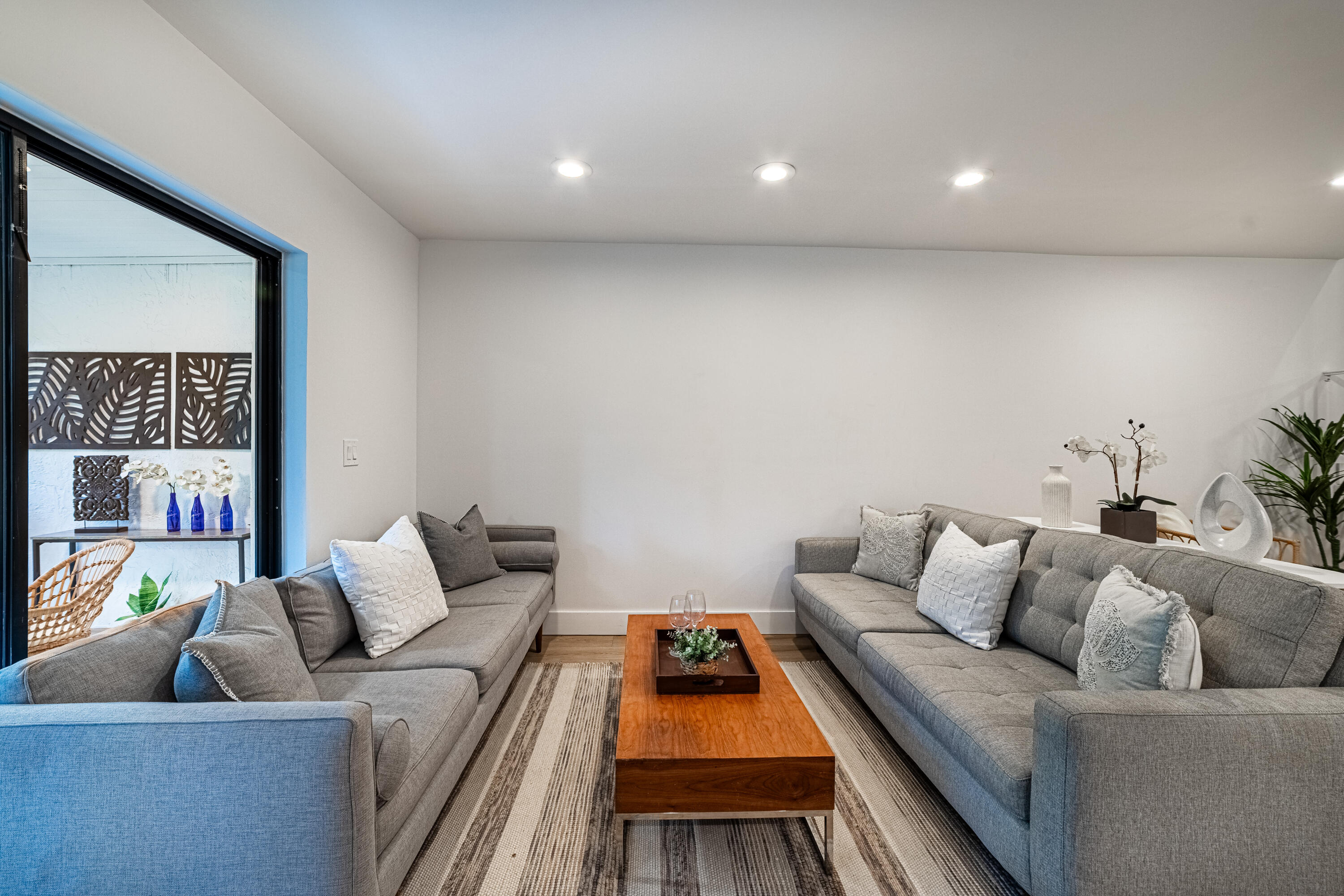 21864 Arriba Real, Unit 3E Boca Raton, FL 33433 - Photo 6 of 32 a living room with furniture and a couch